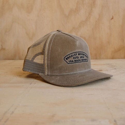 
            
                Load image into Gallery viewer, Arch Trucker Hat - Tan Bradley Mountain 
            
        